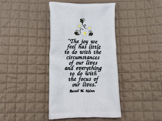 Picture of Embroidered Russel M Nelson Joy Quote kitchen Towel